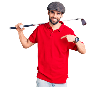 Young handsome man with beard playing golf holding club and ball pointing finger to one self smiling happy and proud - Powered by Adobe