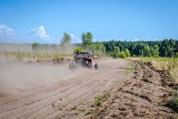 Naklejka premium Cool view on hard ride UTV, ATV, 4x4 in sandy road