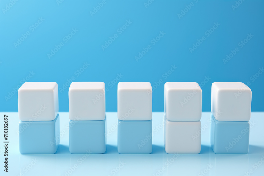 Poster white and blue cubes arranged in row on table. suitable for various presentations and displays.