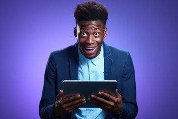Man with surprised expression holding tablet. Can be used to depict shock, surprise, or technology-related concepts.