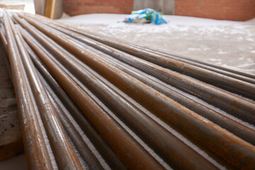 Metal Scraps from Construction Site Rebar Rods Stored in Waste Container