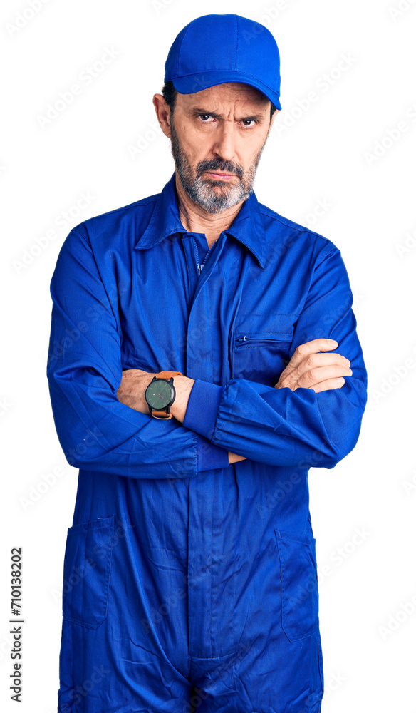 Canvas Prints middle age handsome man wearing mechanic uniform skeptic and nervous, disapproving expression on fac