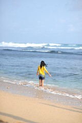 playing in the water on the beach