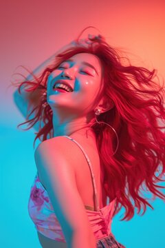 A woman with long red hair laughing. This image captures a genuine moment of joy and happiness. Perfect for adding a touch of positivity to any project