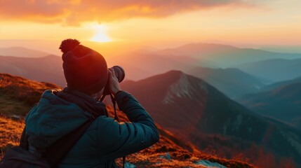 Fototapeta premium A person capturing the beauty of the sun in a photograph. Perfect for capturing moments of awe and wonder.