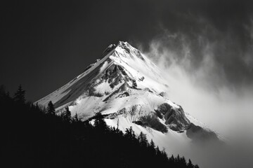 A black and white photo of a snow covered mountain. Suitable for various uses - Powered by Adobe