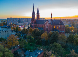 View at Pabianice city and Church of Our Lady of the Rosary from a drone at sunset