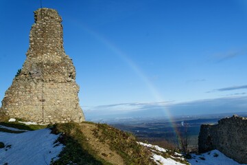 Rainbow arc. View from the ruins of the castle in winter. Old Jicin. Czechia.