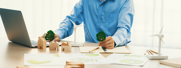 Professional architect plans to use green design in an eco house. Skilled engineer design an eco...