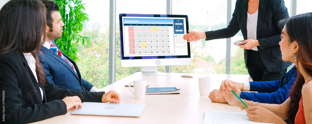 Poster calendar on computer software application for modish schedule planning for personal organizer and on