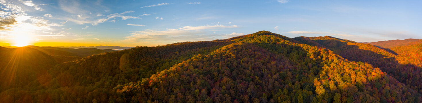 Aerial panorama of the Blue Ridge Mountains of North Carolina at sunrise in full autumn color