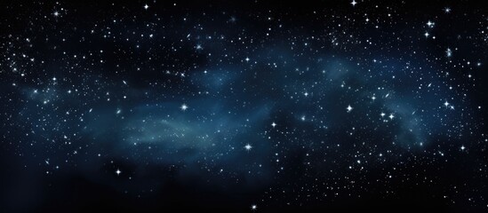 Fototapeta na wymiar Stars in the dark sky as a backdrop with blank area