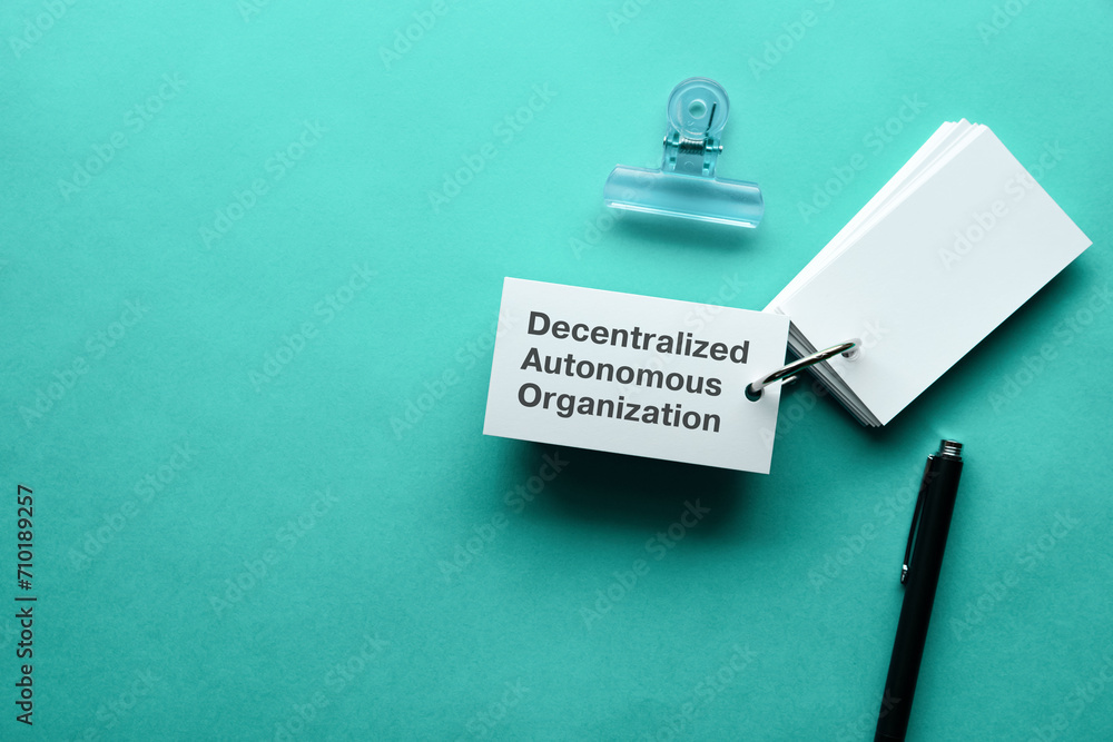 Poster there is word card with the word decentralized autonomous organization. it is as an eye-catching ima