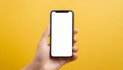 Hand using smartphone with blank screen, isolated on yellow background 