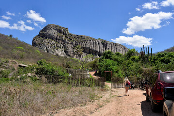 trail in the mountains, woman walking on trail, rural landscape, park entrance, adventure sport,...