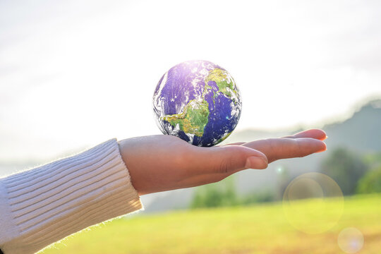 Globe earth in human hand, Environmental protection concept. Elements of this image furnished by NASA.