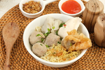 Bakso Malang or bakwan Malang,Meatball Soup,served with noodles, tofu and fried dumpling (pangsit) ,traditional food from Malang,East Java, Indonesia.