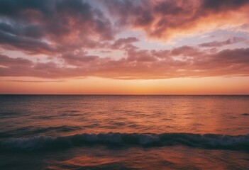 Fototapeta na wymiar Beautiful cloud over ocean water at sunset in Golden pink blue and green tones Colorful natural land