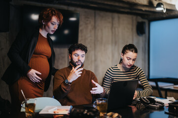 Late night business team analyzing sales stats, planning project development, coordinating tasks. Young executives collaborate for business growth and market expansion.