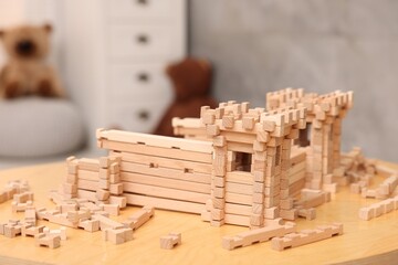 Wooden construction set on table indoors. Children's toy