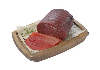 Tasty fresh dry bresaola, peppercorns and thyme isolated on white