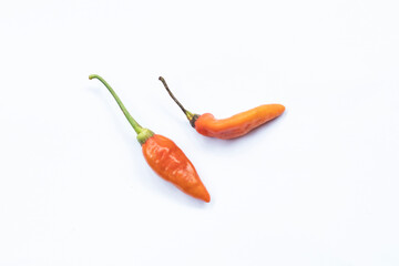 Hot red chili peppers on a white background. Food patterns.
