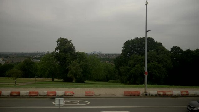 London Car Cars Pass Road 20mph Speed Zone Lamp Post Trees Cloudy Day Loop