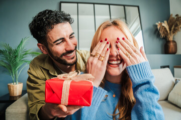 Young caucasian couple celebrating together their relationship anniversary, birthday or valentines...