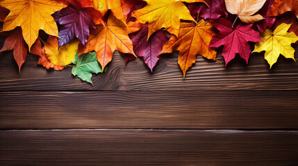 Naklejka na ściany i meble autumn background with colorful leaves on wooden background