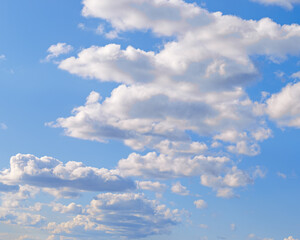 Blue sky with white clouds, tranquil blue trend color, pastel colored cloudscape. Fluffy heaven pattern. Beautiful Cloudy background, nature environment backdrop, wallpaper, screensaver