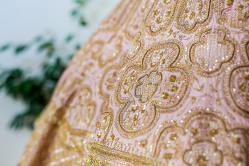 Indian bride's wedding outfit fabric, textile, texture and pattern close up