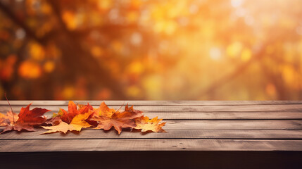 Naklejka na ściany i meble wooden table with autumn leaves background