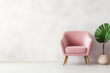 Modern pink armchair against white wall in stylish minimalist interior