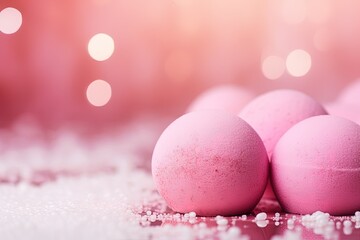 Obraz na płótnie Canvas Pink bath balls on a soapy foam background