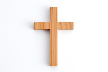 White background with small isolated wooden cross