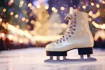 Fototapeten Winter sport concept with closeup skating shoes on outdoor ice rink surrounded by snowy snowflakes and bokeh promoting a healthy lifestyle at a sports stad © The Big L