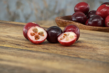 Kitchen scene with fresh cranberries on rustic table