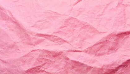 Fototapeta premium The pink crumpled paper background.