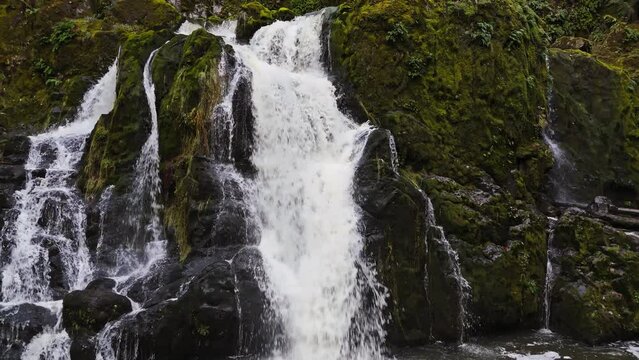4K video close up of peaceful waterfall found in a forest. Pacific Northwest America