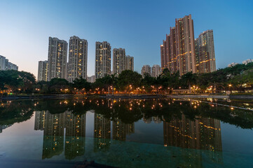 Fototapeta na wymiar High rise residential building in Hong Kong city at dusk