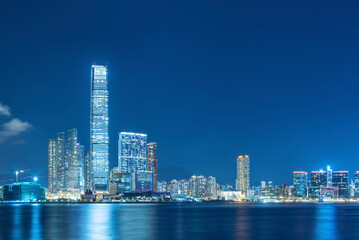 Fototapeta na wymiar Panorama of skyline of Victoria harbor of Hong Kong city at night