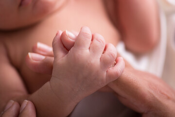 Newborn baby little hands body part affection motherhood - obrazy, fototapety, plakaty