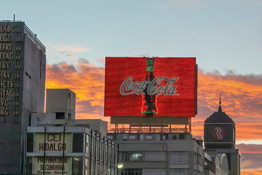 Mexico City, Mexico. Jan 14, 2024. A Coca Cola advertisement sign during a sunset.