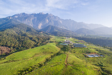 aerial view of Kundasang Sabah landscape and Mount Kinabalu at background during morning.