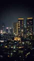 Fototapeta na wymiar Jakarta, Indonesia – November 18, 2023: A night view cityscape of Indonesia capital city Jakarta