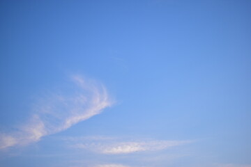 beautiful blue sky and cloud with golden ray sunrise in the morning, natural background