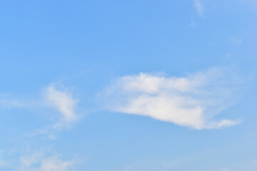 Obraz premium beautiful blue sky and white fluffy group of clouds with sunrise in the morning, natural background