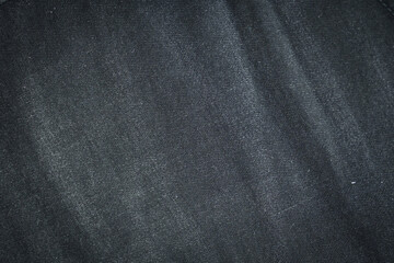 black denim clothing texture background, textile of pants fashion
