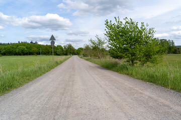 Fototapeta na wymiar Gravel road in the landscape 