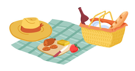 Picnic blanket with hat, food and wicker basket